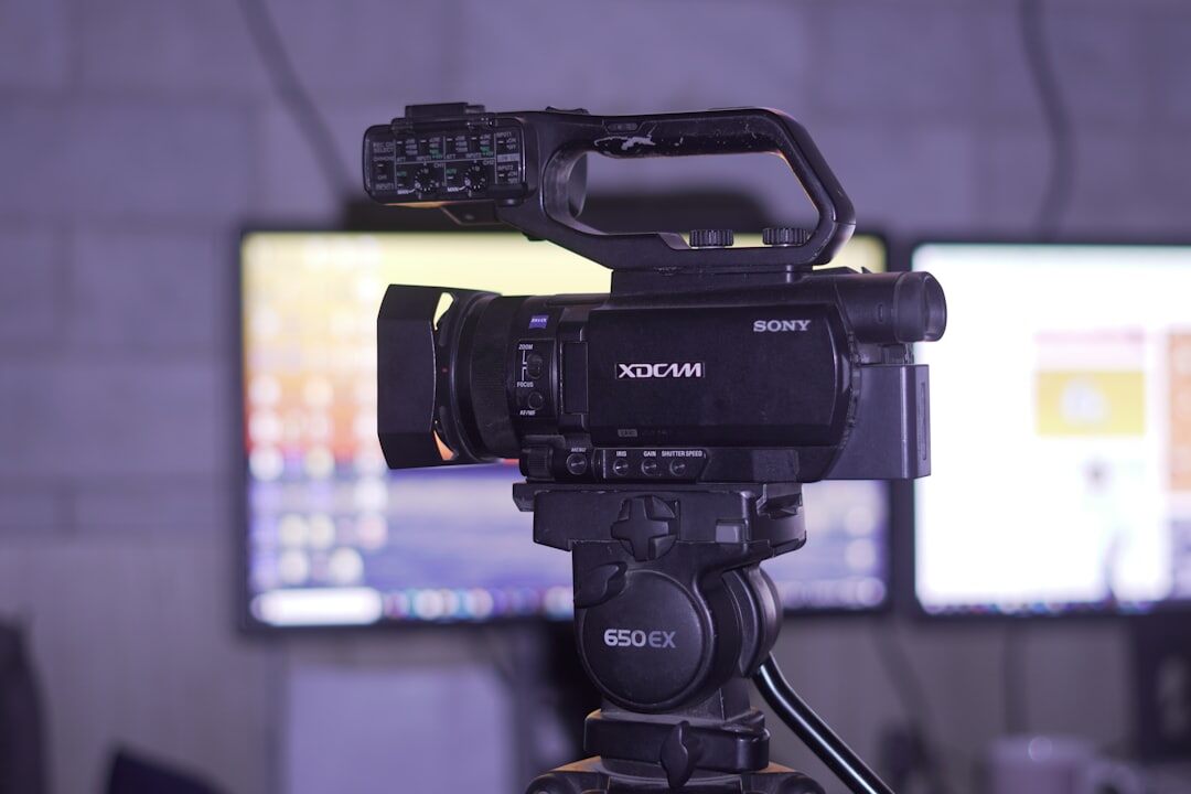 TV presenter in front of camera in broadcast studio
